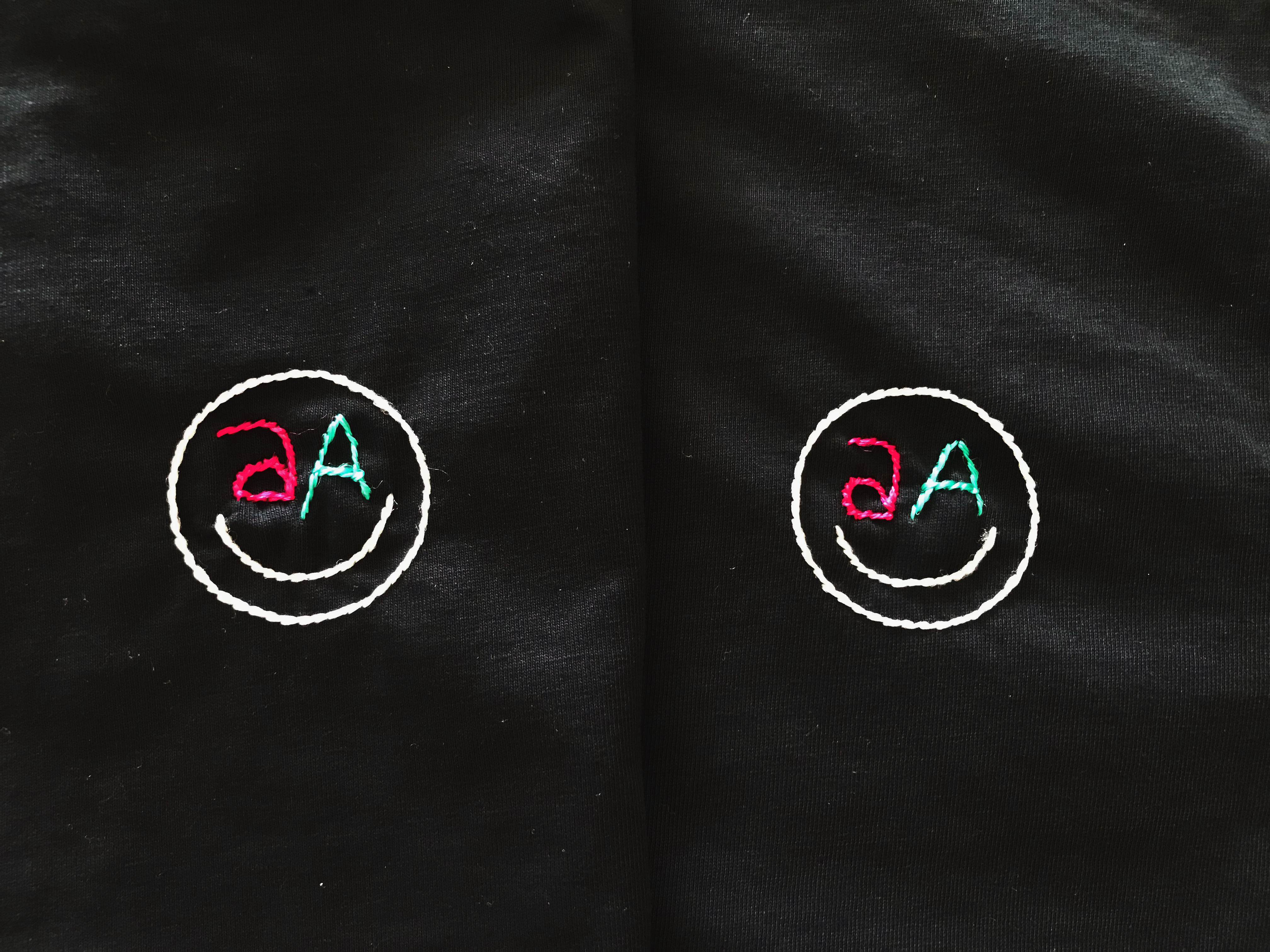 Hand stiched Tee-shirt by Akira. The designs represent our Aa logos