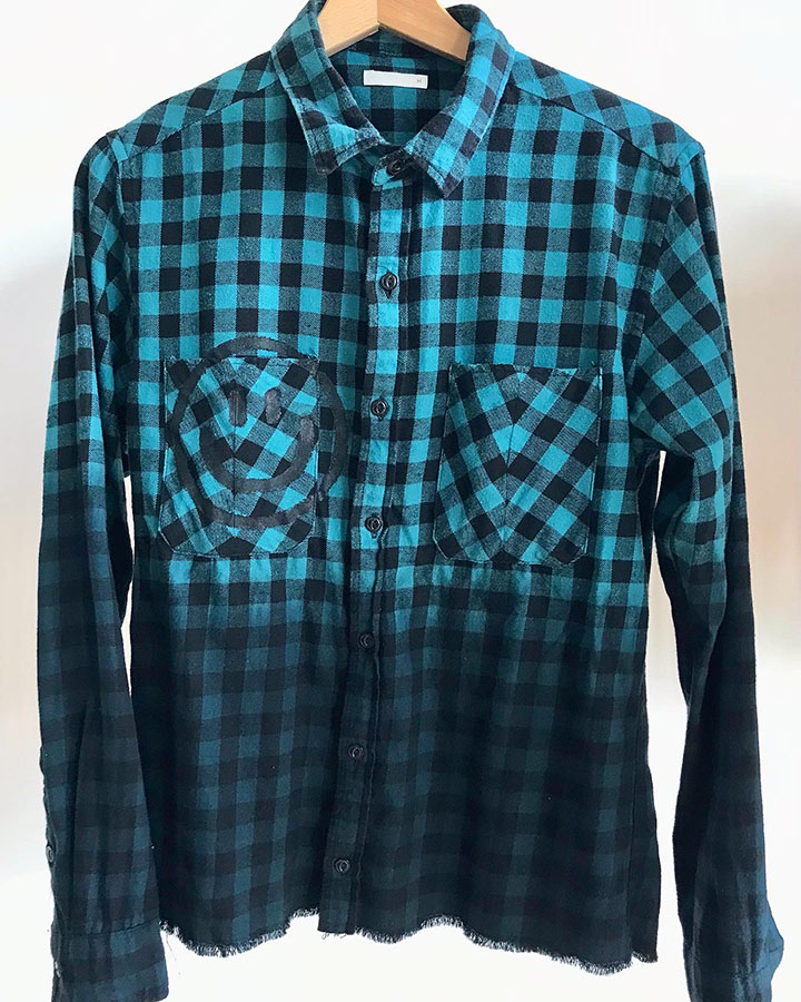 Dyed and cut shirts by Akira.